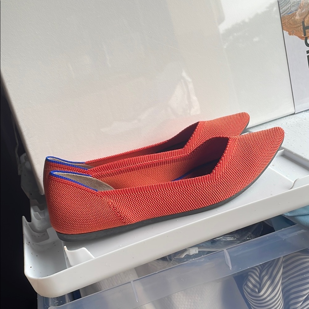 Rothy's Red and Orange Flats Sleek Design Vibrant Colors